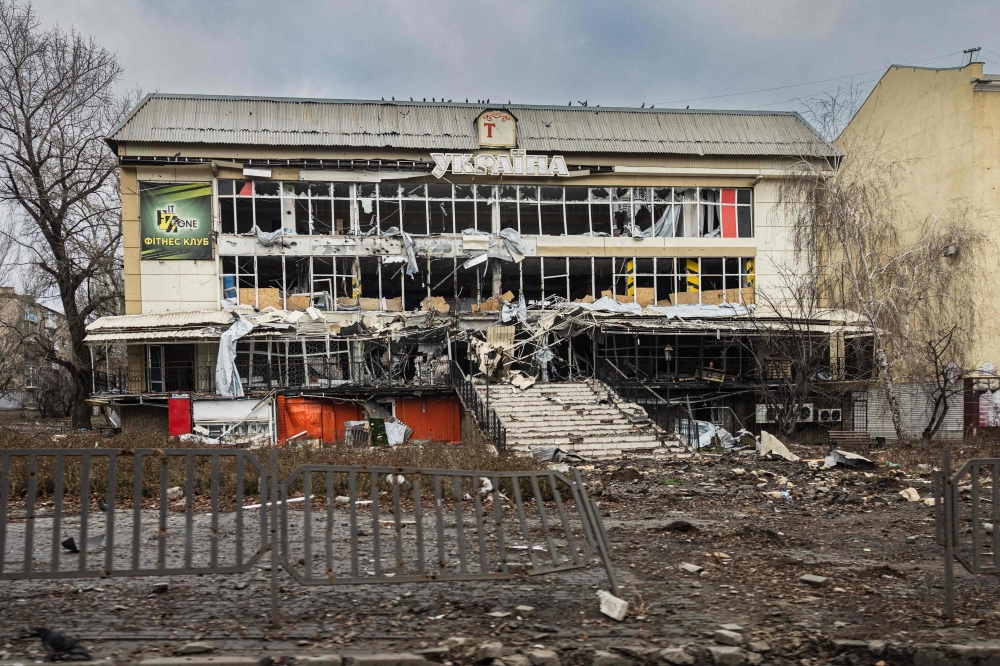 This photograph taken on December 22, 2022, shows a destroyed building in Bakhmut, eastern Ukraine. (Photo by Sameer Al-Doumy / AFP)

