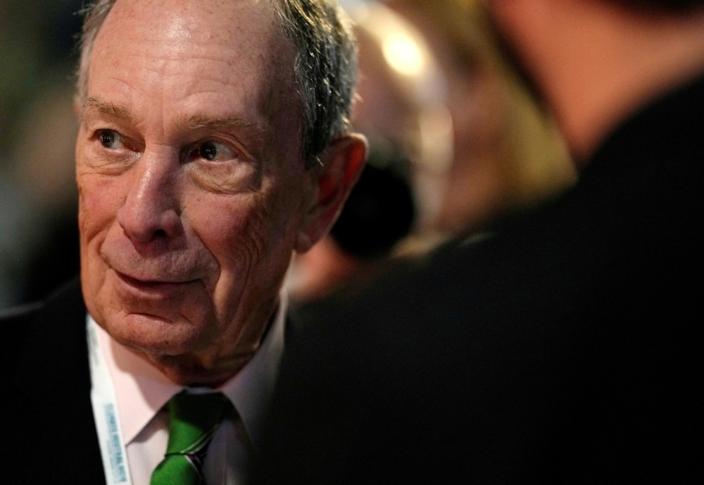 Former mayor of New York Michael Bloomberg speaks with participants prior to a meeting with Earthshot prize winners and finalists at the Glasgow Science Center during the UN Climate Change Conference (COP26) in Glasgow, Scotland, Britain, on November 2, 2021. File Photo / Reuters