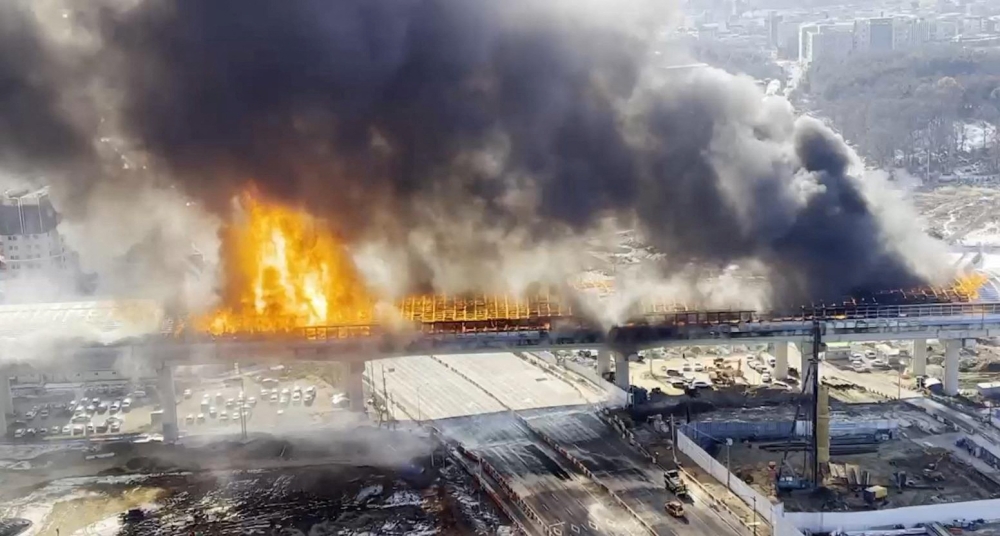 Smoke rises from a burning tunnel in Gwacheon, South Korea, December 29, 2022. Yonhap via REUTERS