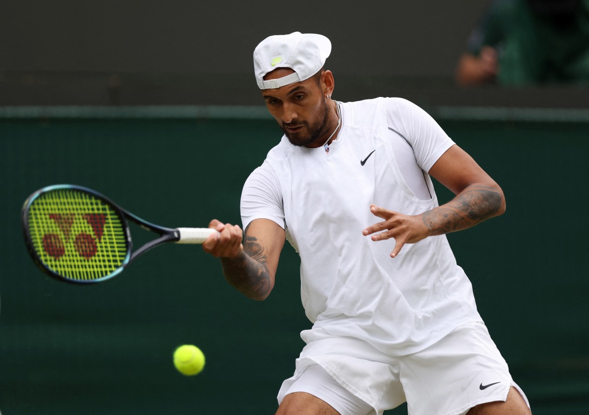 Australia's Nick Kyrgios in action during his quarter-final match against Chile's Cristian Garin at All England Lawn Tennis and Croquet Club, London, Britain, July 6, 2022. (REUTERS/Matthew Childs)