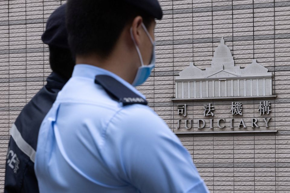 Police stands guard outside the West Kowloon Magistrates' courts in Hong Kong, China, on November 25, 2022. File Photo / Reuters