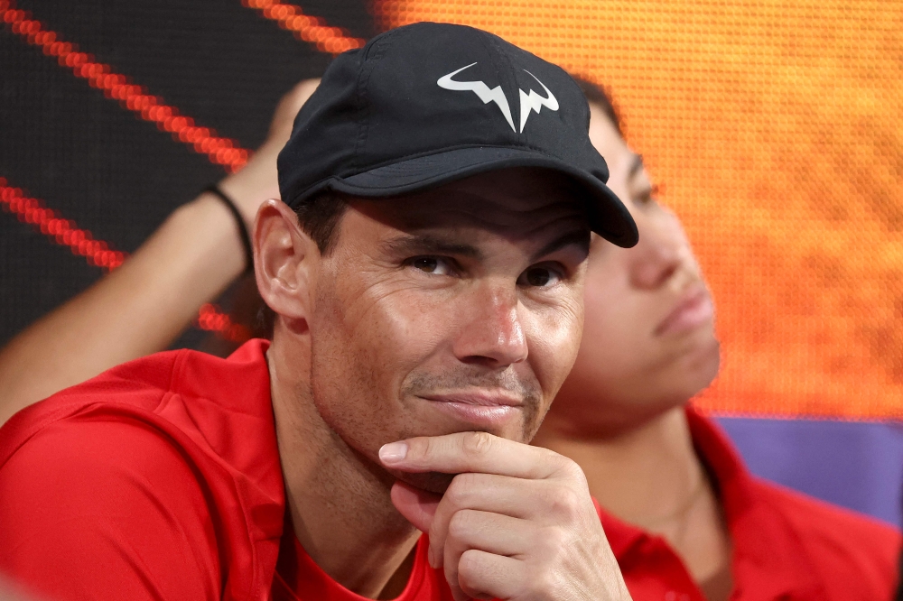 Spain's Rafael Nadal gestures as he watches the women's singles match between Australia's Maddison Inglis and Spain's Nuria Diaz on day five of the United Cup tennis tournament in Sydney on January 2, 2023. (Photo by DAVID GRAY / AFP) /