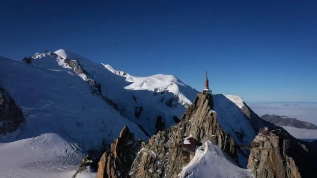 This aerial view of Mont Blanc (back left) and the dome du Gouter (centre) in France in 2019. (Photo by Eric Feferberg / AFP)
