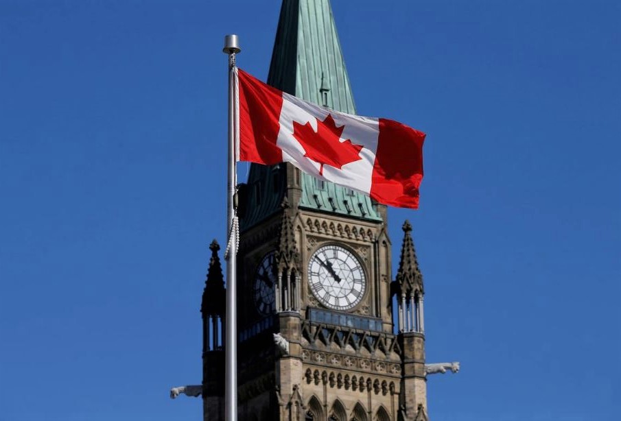 File Photo: A Canadian flag flies in front of the Peace Tower on Parliament Hill in Ottawa, Ontario, Canada, March 22, 2017. (REUTERS/Chris Wattie)
