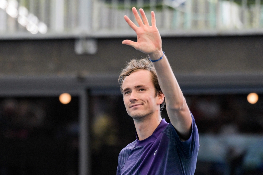 Russia's Daniil Medvedev waves to the crowd after winning his second round match against Serbia's Miomir Kecmanovic at the ATP Adelaide International tennis tournament in Adelaide on January 4, 2023. (Photo by Brenton EDWARDS / AFP) / 