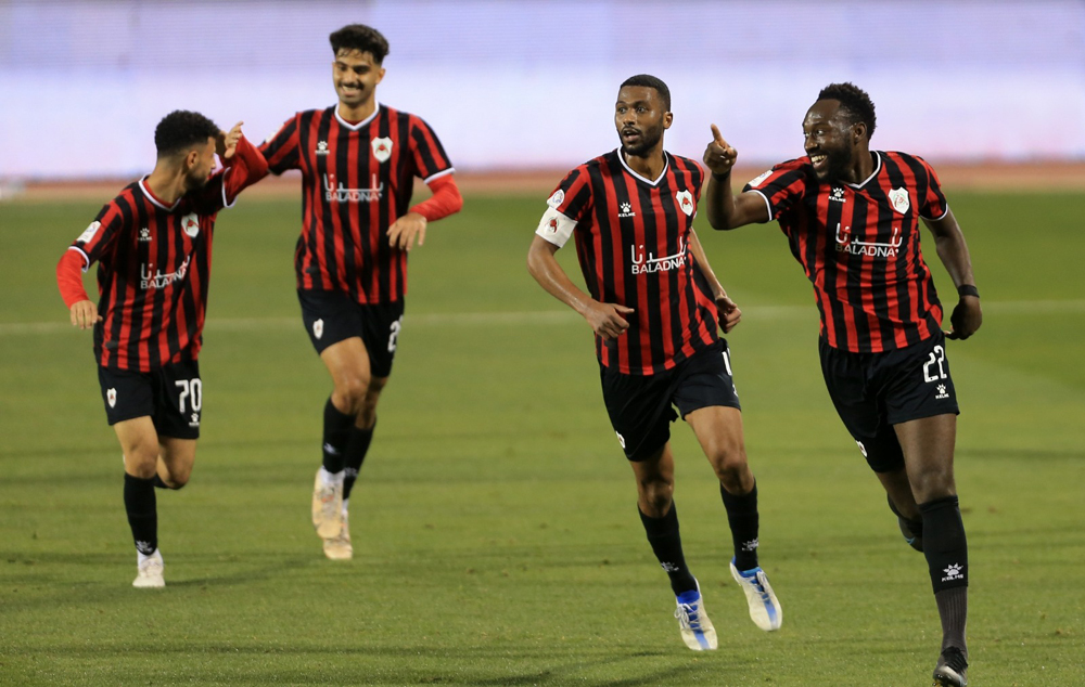 Al Rayyan's Yohan Boli (right) celebrates with teammates after scoring their second goal against Al Sailiya yesterday.