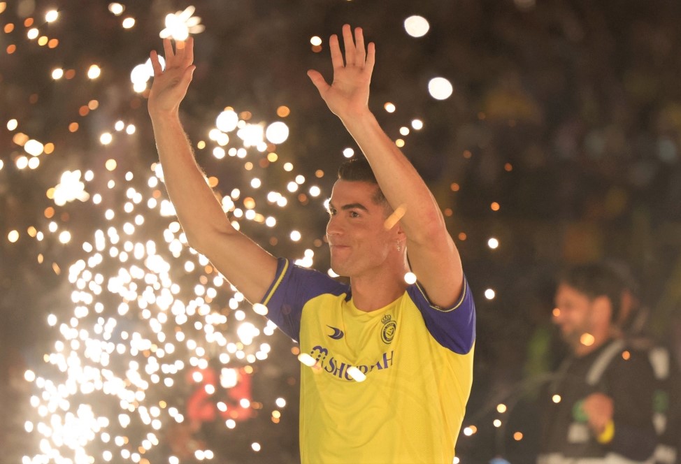 Cristiano Ronaldo greets the fans during his Al Nassr unveiling at the Mrsool Park Stadium in the Saudi capital Riyadh on January 3, 2023. (Photo by Fayez Nureldine / AFP)