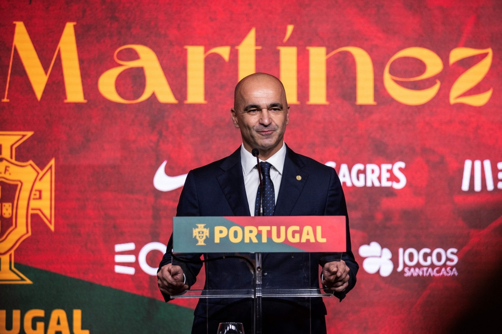 Portugal's new head coach, Spanish Roberto Martinez speaks during a press conference upon his official presentation at the Cidade do Futebol in Oeiras, on January 9, 2023. (Photo by CARLOS COSTA / AFP)