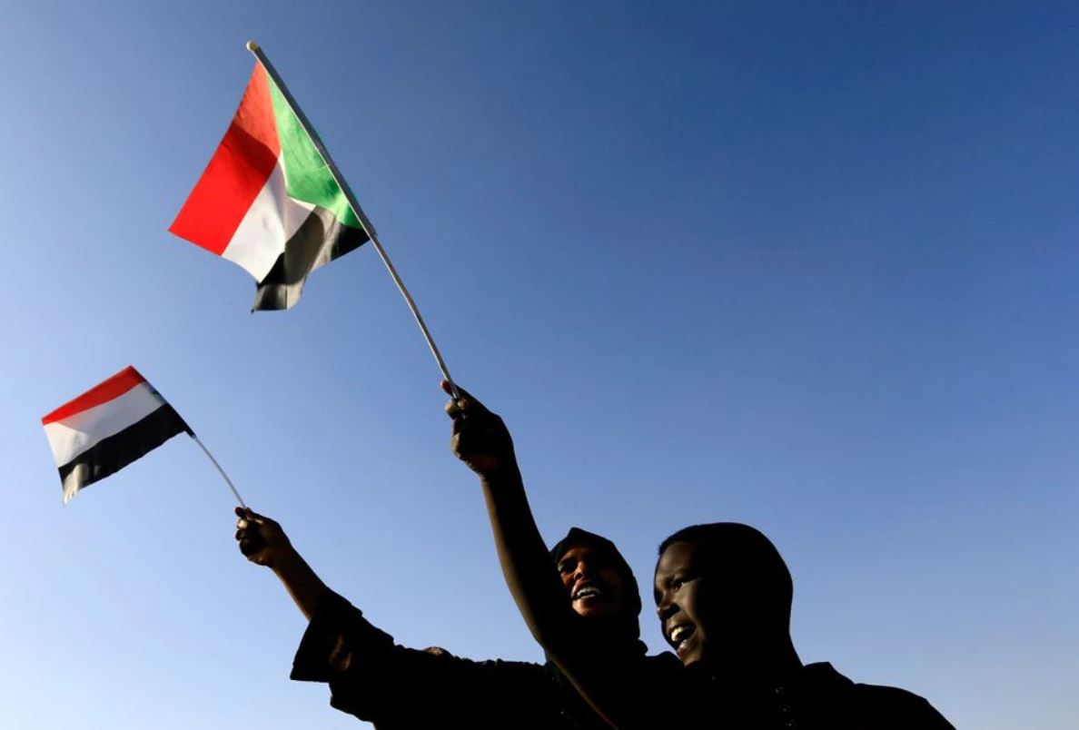 File Photo: Sudanese civilians wave their national flag as they gather at the freedom square during the first anniversary of the start of the uprising that toppled long-time ruler Omar al-Bashir, in Khartoum, Sudan, December 19, 2019. (REUTERS/Mohamed Nureldin Abdallah)