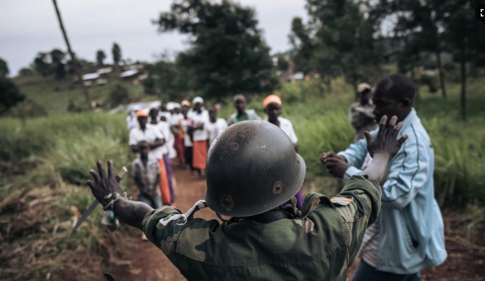 File Photo: A militiaman of the armed group URDPC/CODECO stopped a religious procession in the village of Masumbuko, Ituri Province, northeastern Democratic Republic of Congo on September 18, 2020. (AFP)