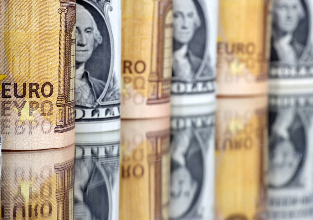 US dollar and Euro banknotes are seen in this illustration taken July 17, 2022. (REUTERS/Dado Ruvic)