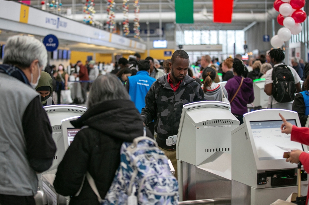 Passengers wait for the resumption of flights at O'Hare International Airport after the Federal Aviation Administration (FAA) had ordered airlines to pause all domestic departures due to a system outage, in Chicago, Illinois, US, on January 11, 2023. REUTERS/Jim Vondruska
