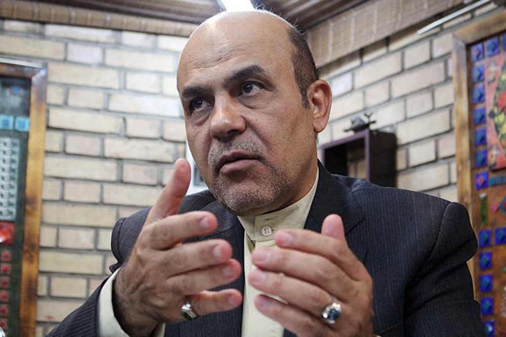 An undated handout picture provided by Khabar Online news agency shows, former Iranian deputy of defence minister, British-Iranian national Alireza Akbari, during an interview in Tehran. - Iran has sentenced Akbari to death after his conviction for spying for British intelligence services, the Islamic republic's judicial news agency reported January 11, 2023. (Photo by Khabar Online / AFP)