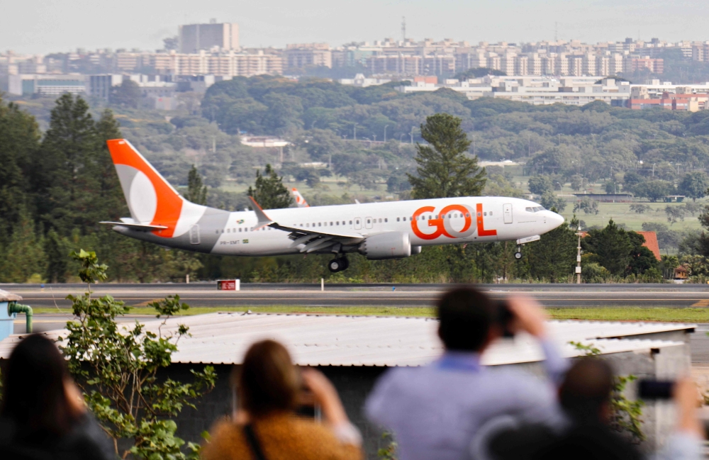 An aircraft carrying former Brazilian Justice Minister and former Secretary of Public Security of the Federal District Anderson Torres from Miami, US, lands at Brasilia airport on January 14, 2023. (Photo by Sergio LIMA / AFP)