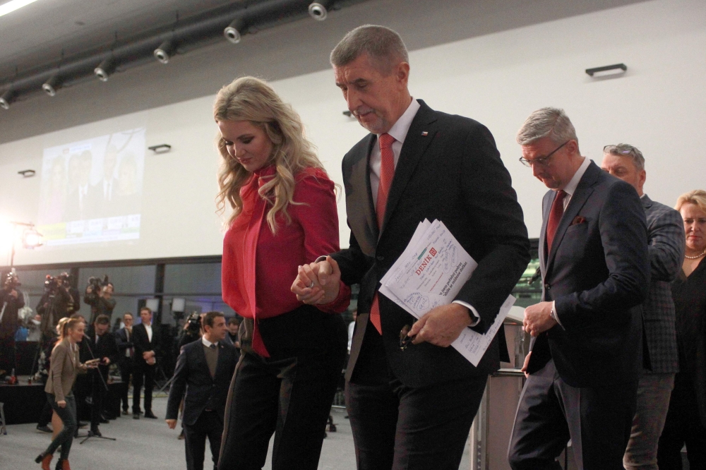 Presidential candidate and former Czech Prime Minister Andrej Babis and his wife Monika Babisova leave following a press conference after the 1st round of the presidential election on January 14, 2023 in Prague. (Photo by Milan Kammermayer / AFP)