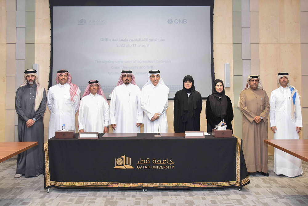 Qatar University and QNB Group officials at the MoUs signing event.