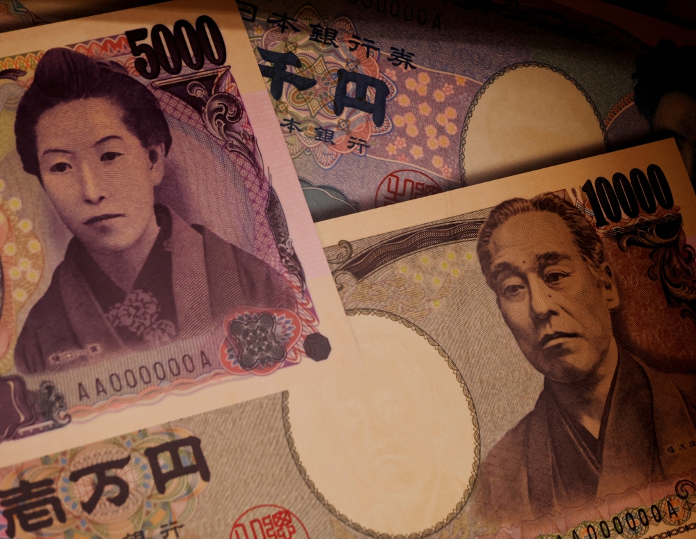 Examples of Japanese yen banknotes are displayed at a factory of the National Printing Bureau producing Bank of Japan notes at a media event about a new series of banknotes scheduled to be introduced in 2024, in Tokyo, Japan, November 21, 2022. (REUTERS/Kim Kyung-Hoon)