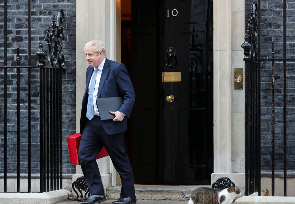 File Photo: British Prime Minister Boris Johnson walks outside 10 Downing Street in London, Britain, January 31, 2022. (REUTERS/May James)