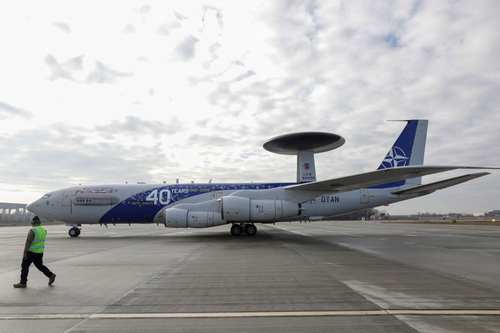 A NATO AWACS surveillance plane is parked at the Romanian Air Force 90th Airlift Base, in Otopeni, Ilfov, Romania, January 17, 2023. (Inquam Photos/George Calin via REUTERS)