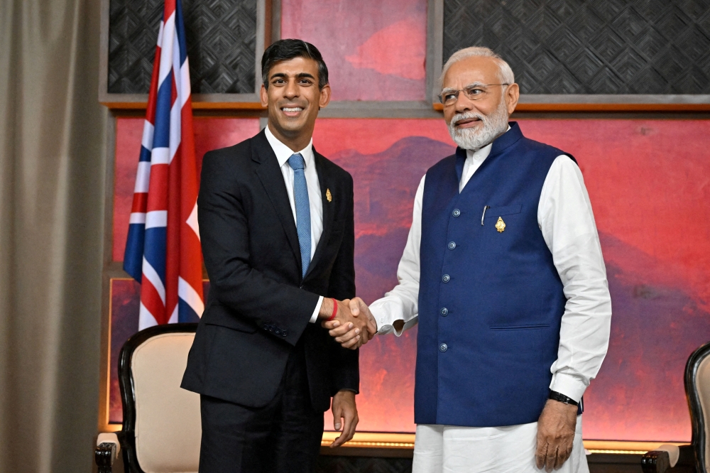 British Prime Minister Rishi Sunak and India's Prime Minister Narendra Modi hold a bilateral meeting on November 16, 2022 in Nusa Dua, Indonesia. (eon Neal/Pool via REUTERS)