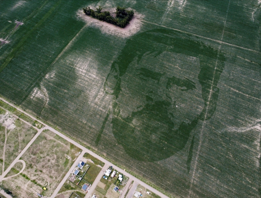 The face of Argentine football star Lionel Messi is depicted in a corn field sown with a special algorithm to plant seeds in a certain pattern to create a huge visual image when the corn plants grow, in Los Condores, on the outskirts of Cordoba, Argentina, January 15, 2023. (REUTERS/Agustin Marcarian)