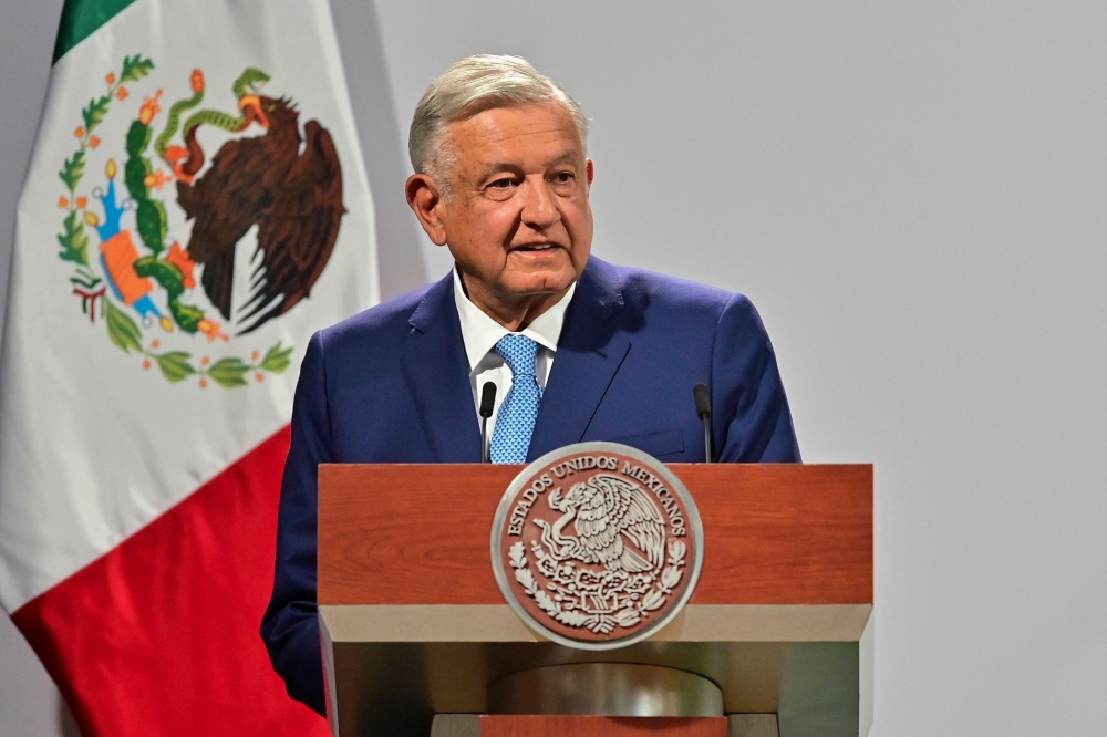 In this file photo taken on March 30, 2021, Mexican President Andres Manuel Lopez Obrador speaks during a ceremony to mark the 100th day of his third year in office, at the National Palace in Mexico City.  (Photo by Pedro PARDO / AFP)