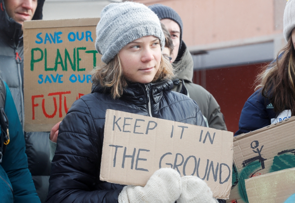 Climate activist Greta Thunberg takes part in a protest on the last day of the World Economic Forum (WEF) in Davos, Switzerland January 20, 2023. REUTERS/Arnd Wiegmann