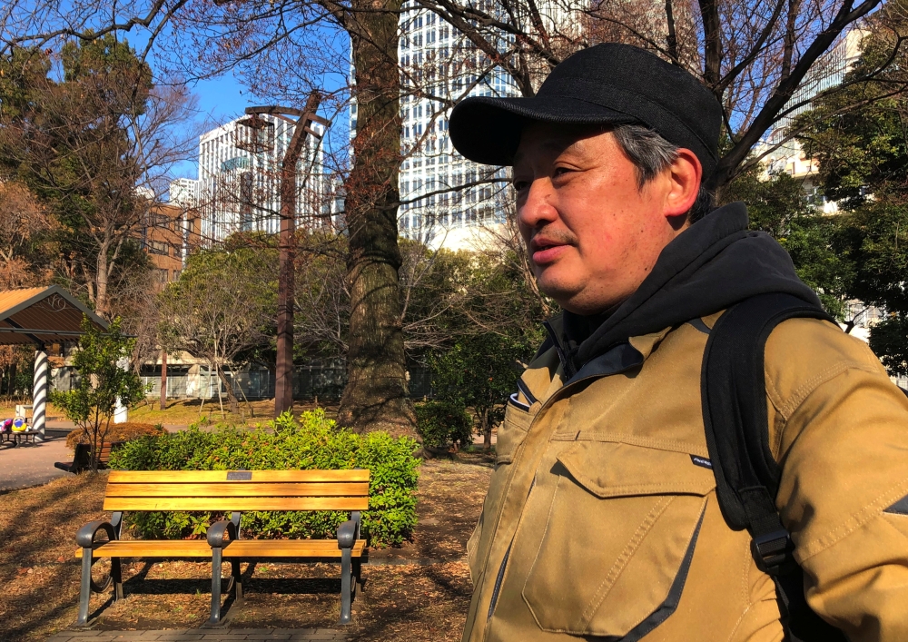 Day labourer Masami Fujino poses for a photo during an interview with Reuters at a park in Tokyo, Japan January 20, 2023. REUTERS/ Elaine Lies