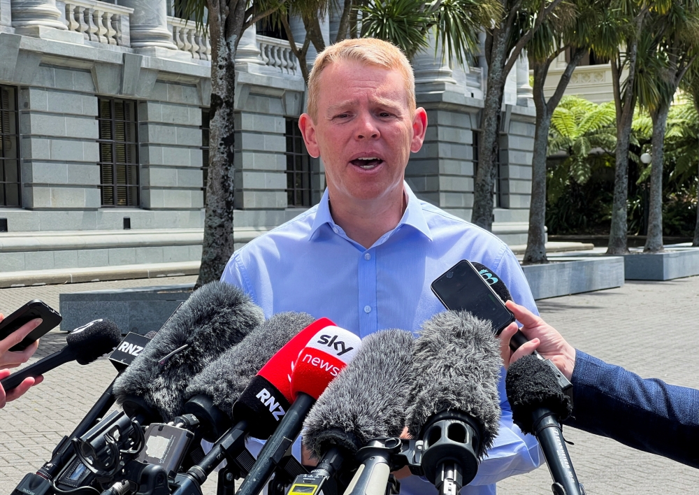 Chris Hipkins speaks to members of the media, after being confirmed as the only nomination to replace Jacinda Ardern as leader of the Labour Party, outside New Zealand's parliament in Wellington, New Zealand January 21 2023. REUTERS/Lucy Craymer