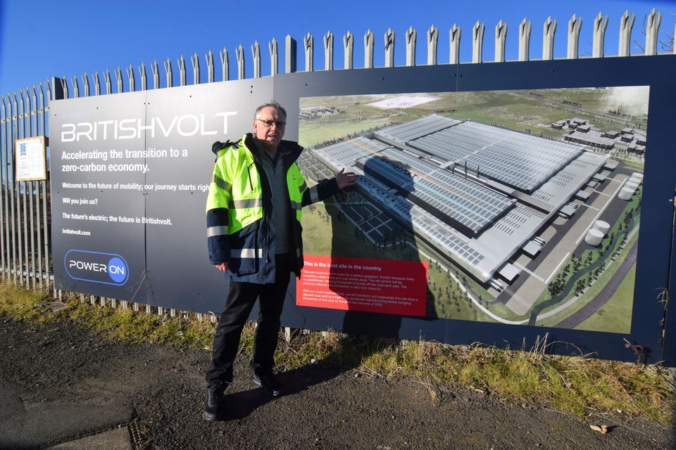 Peter Rolton, executive chairman of Britishvolt, shows a billboard at the site of the company’s large planned battery plant in the former industrial town of Blyth, Britain, on January 27, 2022. File Photo / Reuters
