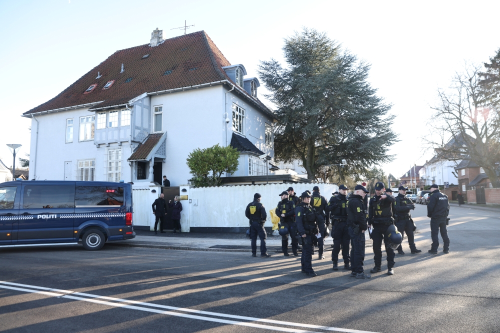 Police patrols the area in front of the Turkish embassy, where Danish far-right politician Rasmus Paludan has announced to burn a copy of the Holy Quaran, in Copenhagen, Denmark, January 27, 2023. (Ritzau Scanpix/Olafur Steinar Gestsson via REUTERS)