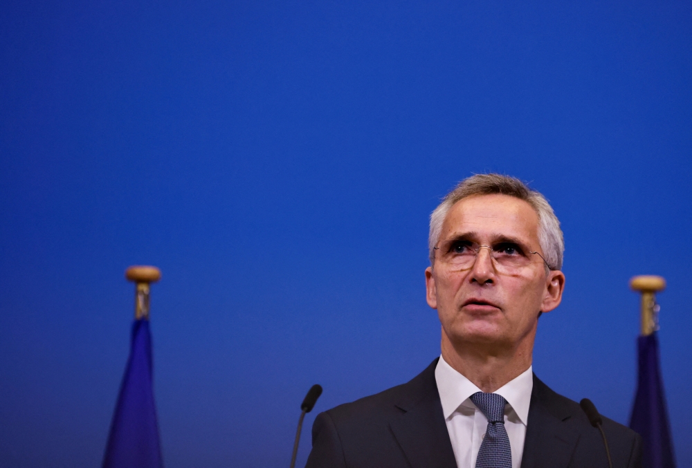 NATO Secretary General Jens Stoltenberg speaks during a joint news conference with European Council President Charles Michel and European Commission President Ursula von der Leyen at NATO headquarters in Brussels, Belgium, January 10, 2023. REUTERS/Johanna Geron/File Photo
