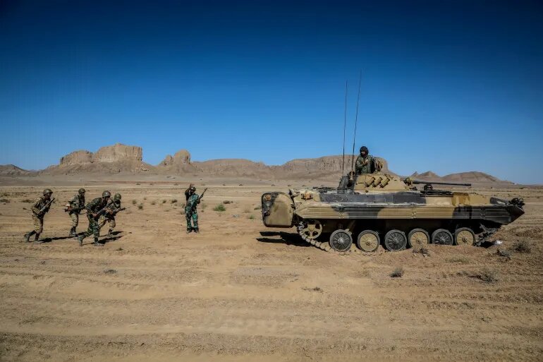 Members of the Iranian Army take part in a military exercise in Isfahan on September 8, 2022. [File: Handout/WANA via Reuters]
