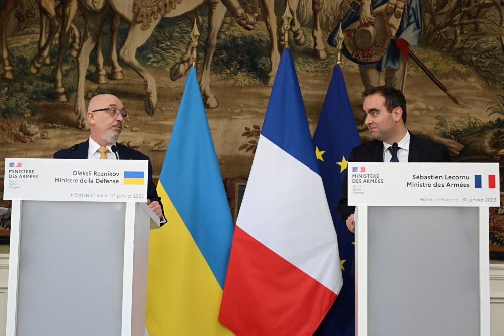 Ukrainian Defence Minister Oleksii Reznikov and French Defence Minister Sebastien Lecornu address a press conference as part of Ukraine's Defence Minister's official visit, at the Hotel de Brienne, the French Ministry of Armed Forces, in Paris on January 31, 2023. JULIE SEBADELHA/Pool via REUTERS