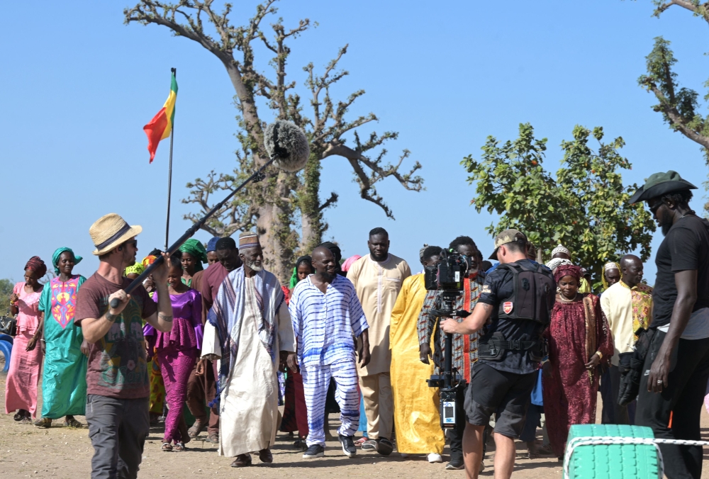 The French rapper Kery James acts while filming Banlieusard 2, in the forest of Bandia in Sindia, region of Thies west center of Senegal, on December 17, 2022. - Banlieusard 2 is scheduled for release on Netflix later this year. The American streaming giant is making its mark in francophone West Africa, part of a broader surge in audiovisual production in the region following years of sluggishness. Outside Nollywood in anglophone Nigeria, production has been rising fast, driven by Senegal and Ivory Coast. (Photo by SEYLLOU / AFP)
