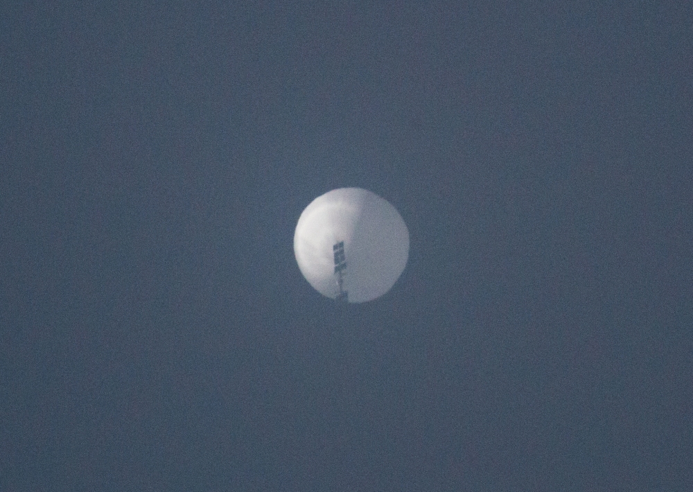 A balloon flies in the sky over Billings, Montana, U.S. February 1, 2023 in this picture obtained from social media. Chase Doak/via Reuters 