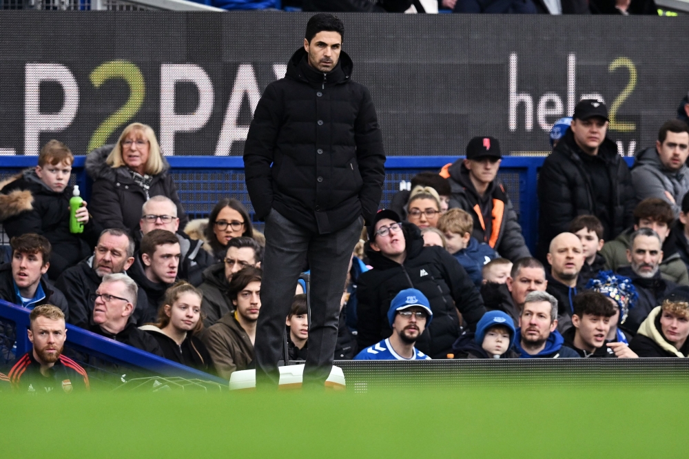 Arsenal's Spanish manager Mikel Arteta observes the English Premier League football match between Everton and Arsenal at Goodison Park in Liverpool, north-west England, on February 4, 2023. (Photo by Paul ELLIS / AFP)