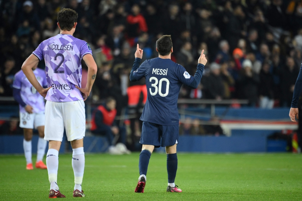 Paris Saint-Germain's Argentine forward Lionel Messi celebrates after scoring his team's second goal during the French L1 match between Paris Saint-Germain (PSG) and Toulouse FC at the Parc des Princes stadium in Paris on February 4, 2023. (Photo by FRANCK FIFE / AFP)