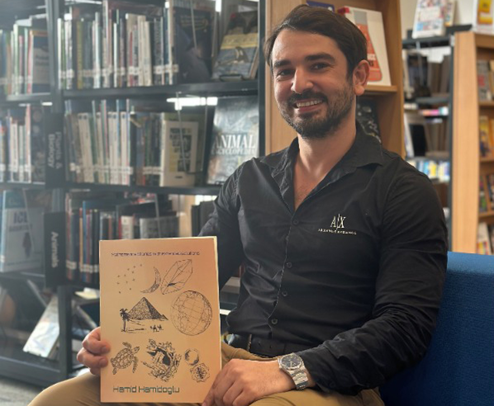 Hamid Hamidoglu with his book.