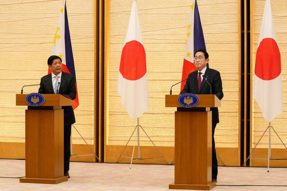Japanese Prime Minister Fumio Kishida and Philippine President Ferdinand Marcos attend a press conference at the prime minister's official residence in Tokyo on February 9, 2023. (Photo by Kimimasa MAYAMA / POOL / AFP)