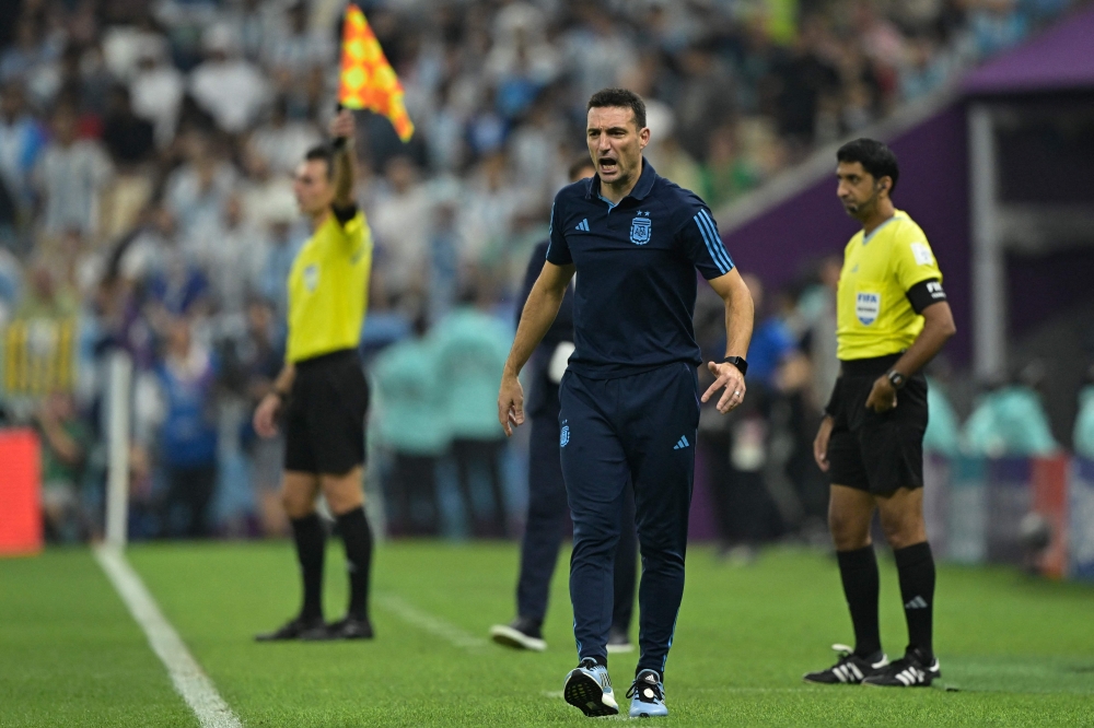 Argentina's coach Lionel Scaloni reacts on the touchline during the Qatar 2022 World Cup semi-final match between Argentina and Croatia at Lusail Stadium in Lusail, north of Doha on December 13, 2022. File photo/ AFP

