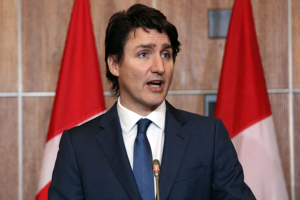In this file photo taken on February 21, 2022, Canadian Prime Minister Justin Trudeau speaks during a news conference in Ottawa, Ontario, Canada. (Photo by Dave Chan / AFP)