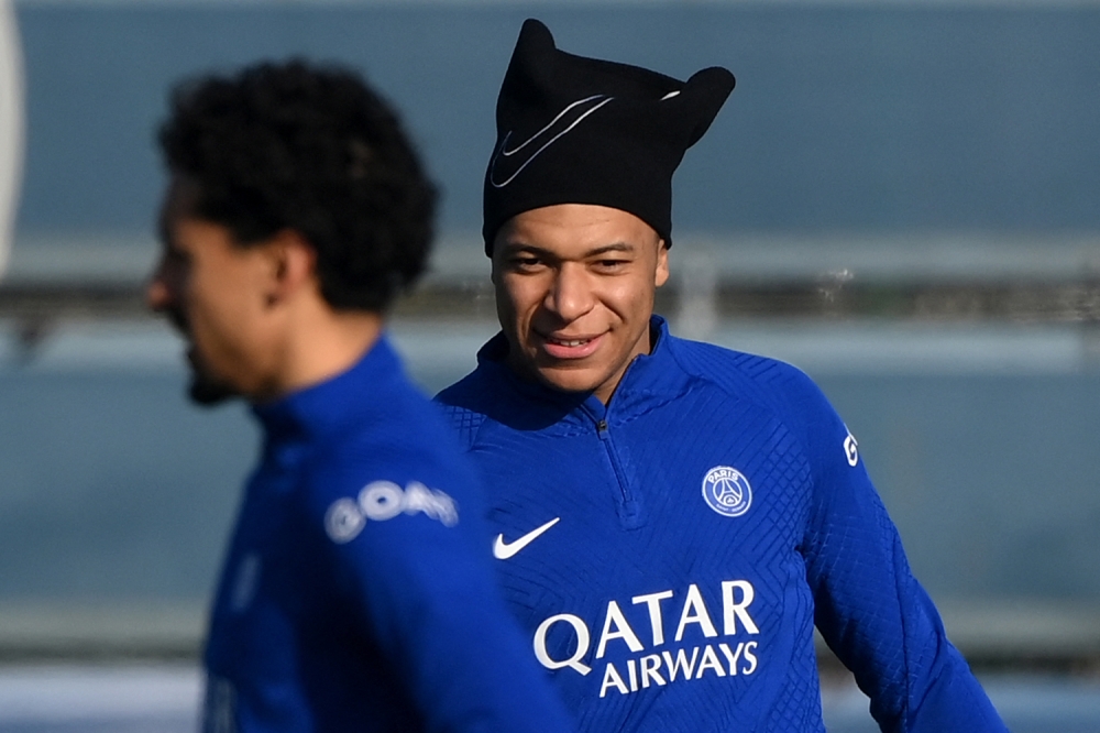 Paris Saint-Germain's French forward Kylian Mbappe takes part in a training session in Saint-Germain-en-Laye, west of Paris on February 13, 2023, on the eve of the UEFA Champions League round of Last 16 First leg football match against FC Bayern Munich. (Photo by FRANCK FIFE / AFP)