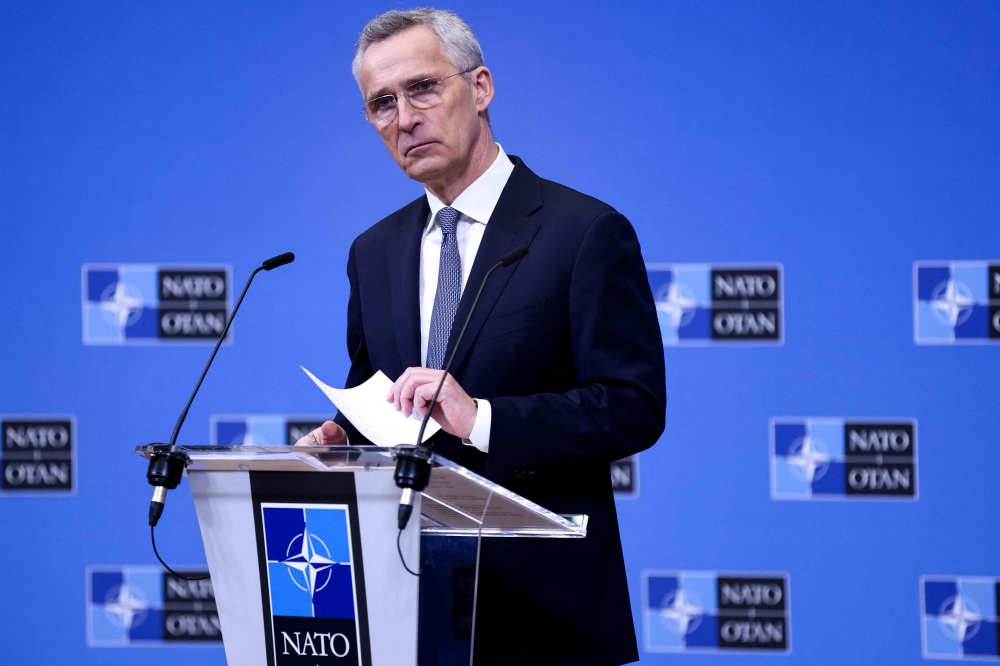 NATO Secretary General Jens Stoltenberg addresses a press conference ahead of a NATO Defence ministers' meeting at the NATO headquarters in Brussels on February 13, 2023. (Photo by Kenzo Tribouillard / AFP)