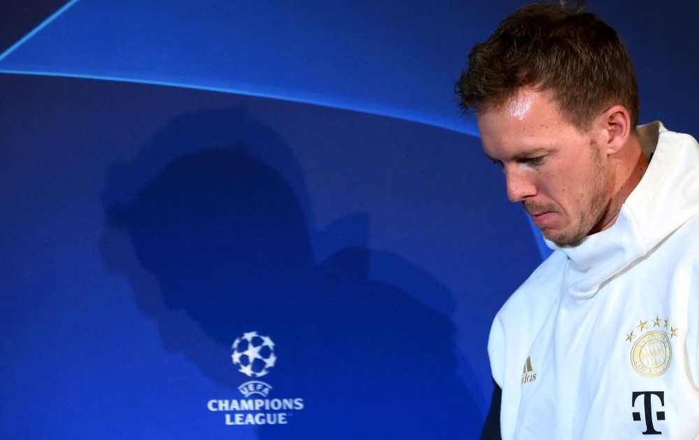 Bayern Munich's German head coach Julian Nagelsmann arrives for a press conference in Paris on the eve of the UEFA Champions League round of 16 football match Bayern Munich against Paris Saint-Germain (PSG) on February 13, 2023. (Photo by FRANCK FIFE / AFP)