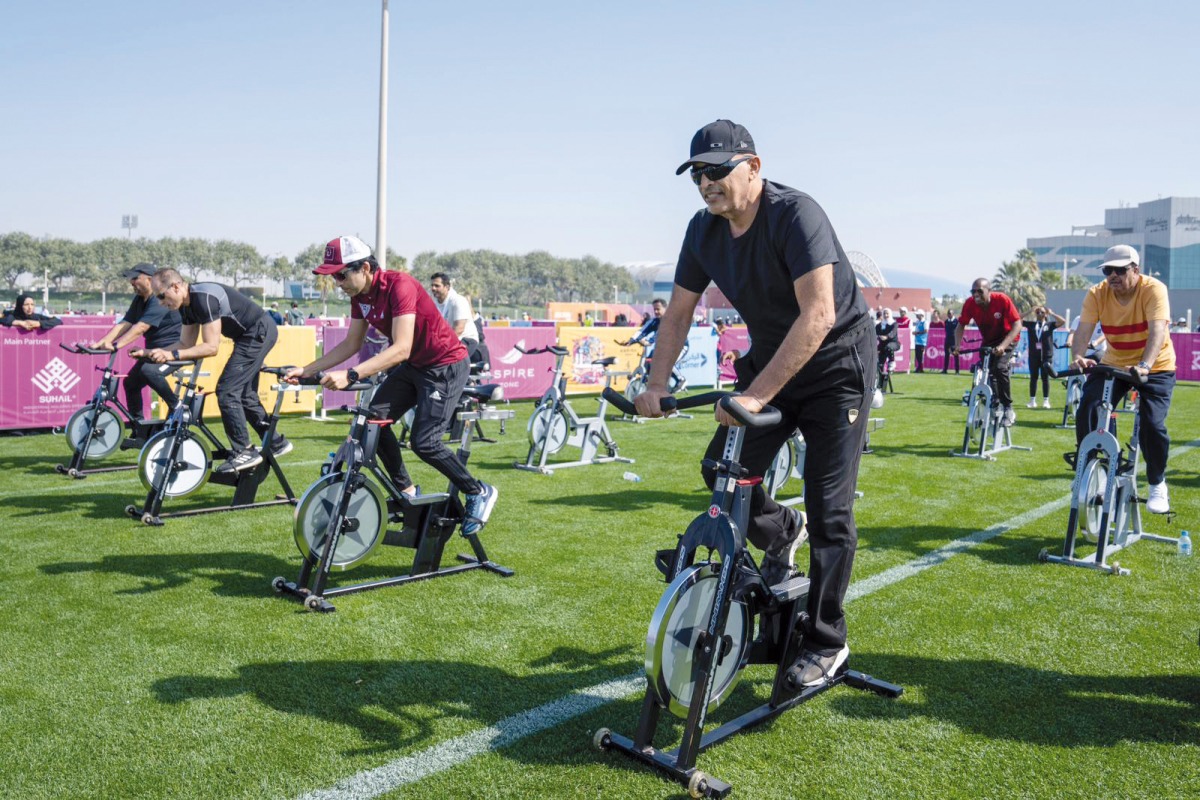 Speaker of the Shura Council H E Hassan bin Abdullah Al Ghanim participates in a Sport Day activity. 