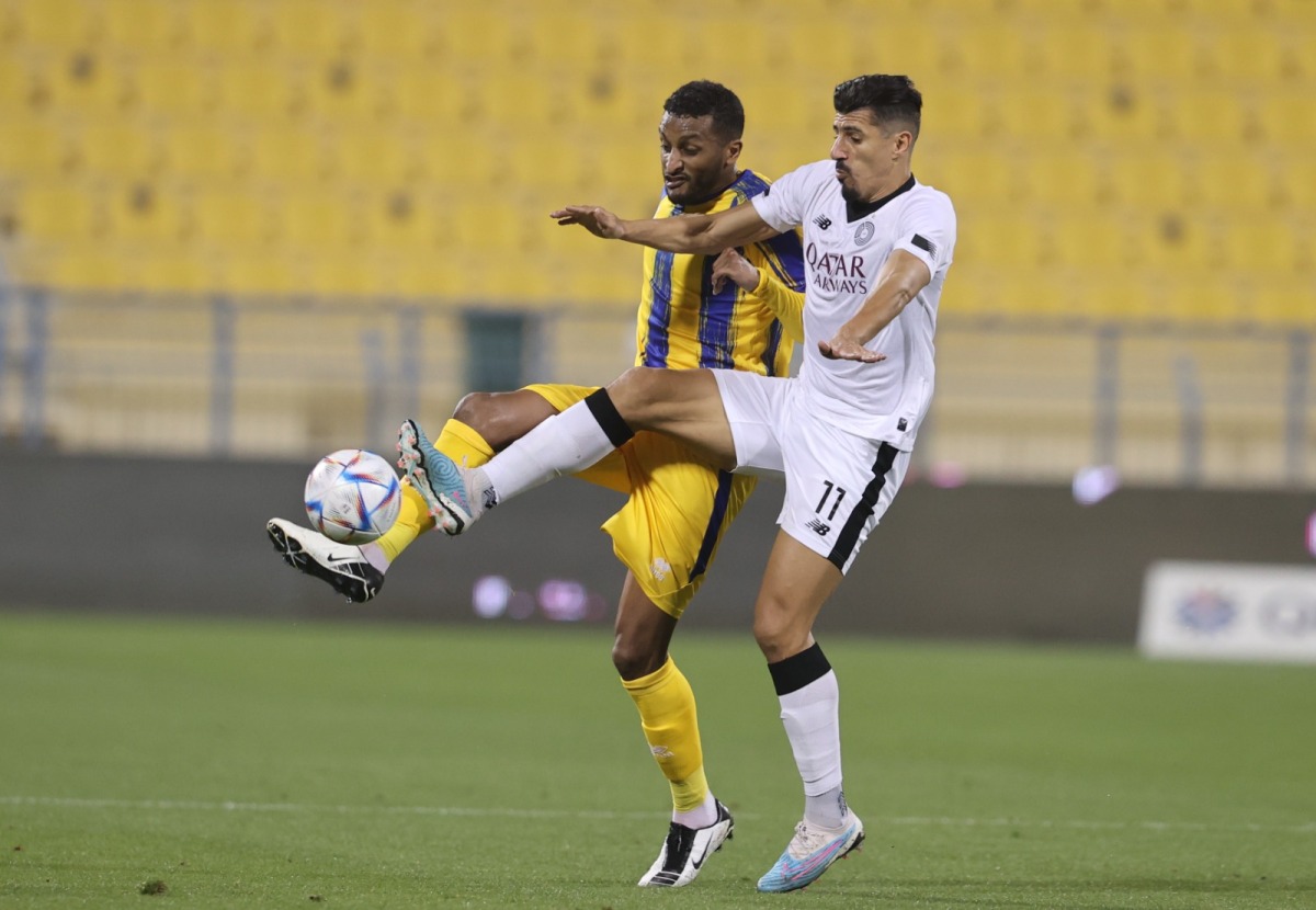 Al Sadd’s Baghdad Bounedjah (right) in action yesterday. 