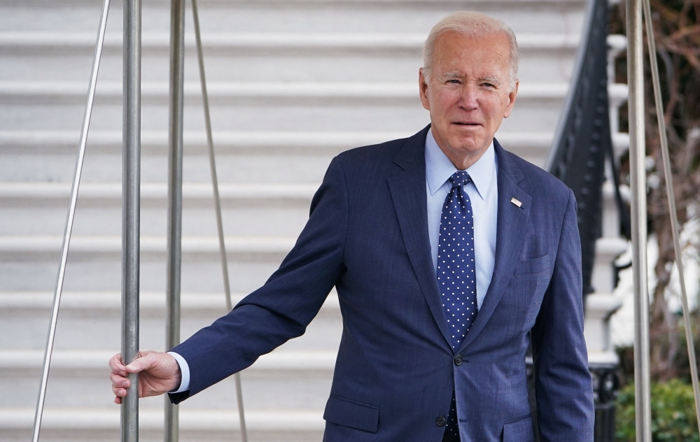 US President Joe Biden makes his way to board Marine One before departing from the South Lawn of the White House in Washington, DC on February 16, 2023.  (Photo by MANDEL NGAN / AFP)
 