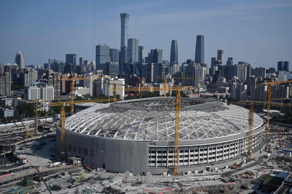 (FILES) This file photo taken on May 18, 2022 shows a general view of the construction site of the Workers' Stadium, a planned venue for the 2023 Asian Cup, in Beijing. - Alleged corruption at the top of Chinese football has left President Xi Jinping's dream of his country becoming a global force in the sport appear more remote than ever. (Photo by Jade Gao / AFP)