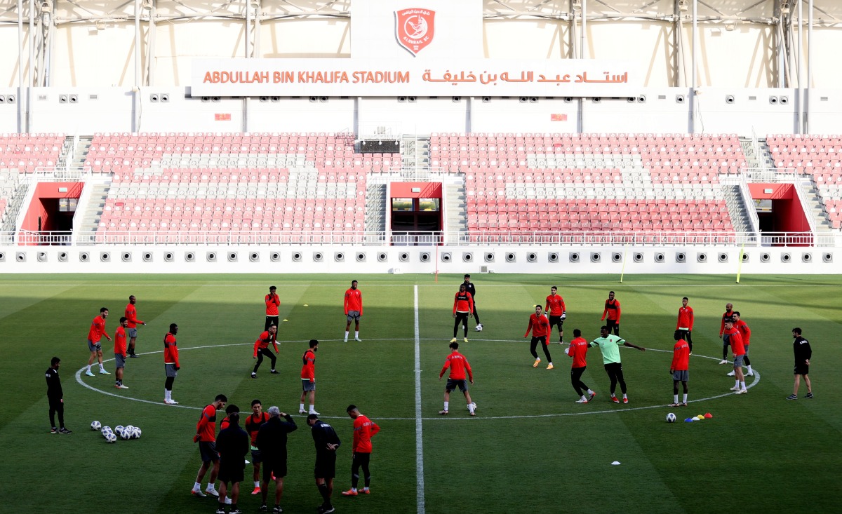 Al Duhail players during a training session, yesterday.